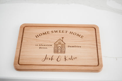 Personalized wooden cutting board with "Home Sweet Home" engraving, ideal housewarming or new home gift by Custom Chic