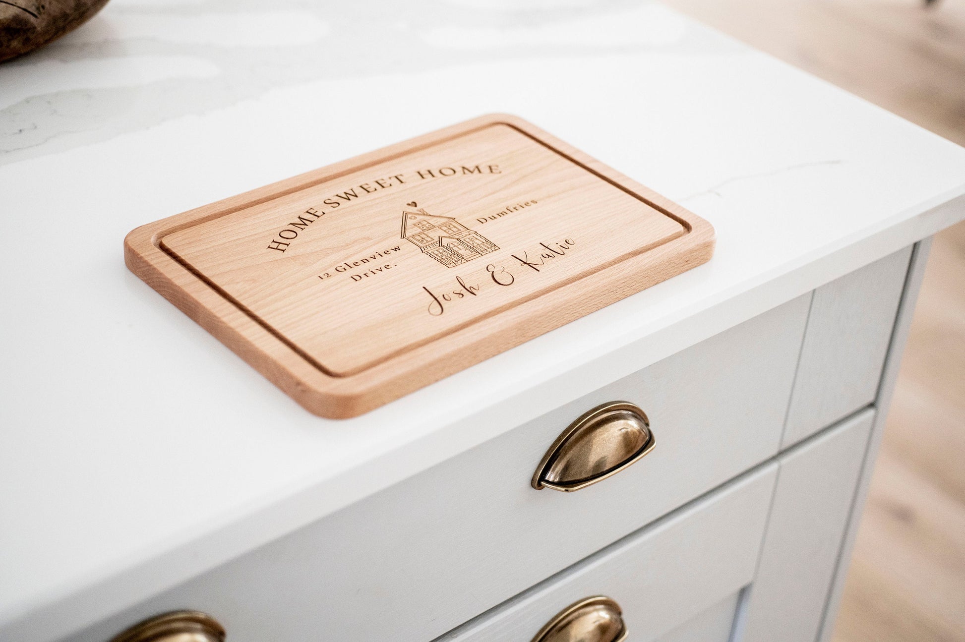 Personalized wooden cutting board from Custom Chic with "Home Sweet Home" design, ideal for housewarming or new home gifts.