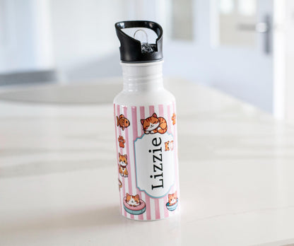 Personalized water bottle with cartoon character design on a white surface