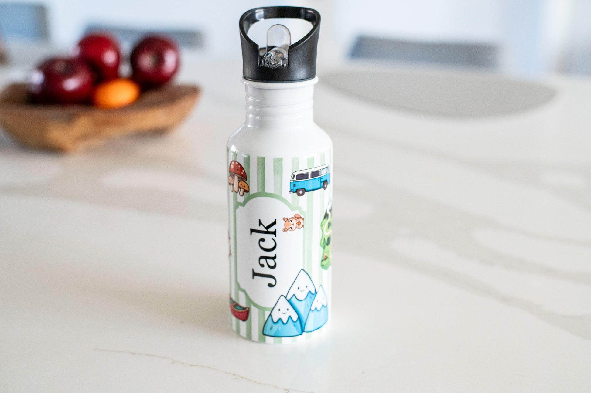 Personalized water bottle with 'Jack' on a kitchen counter